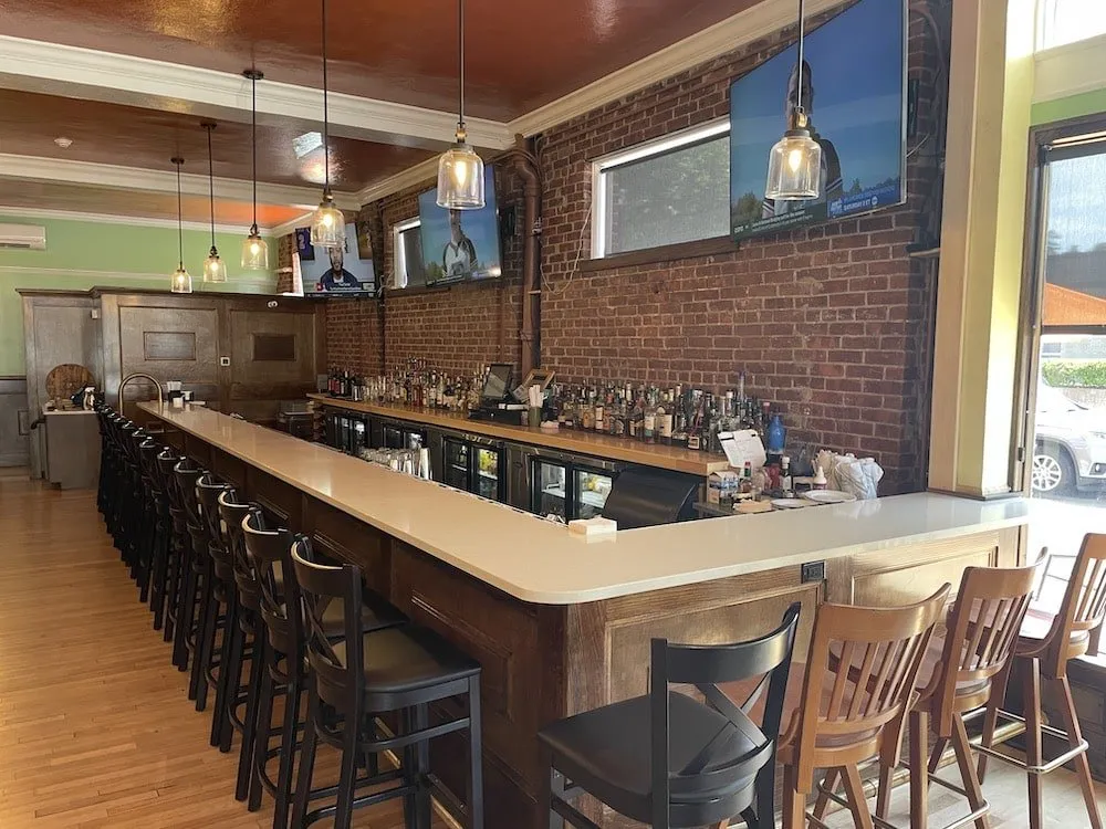 Michael's Trattoria bar with exposed brick wall in Wallingford CT